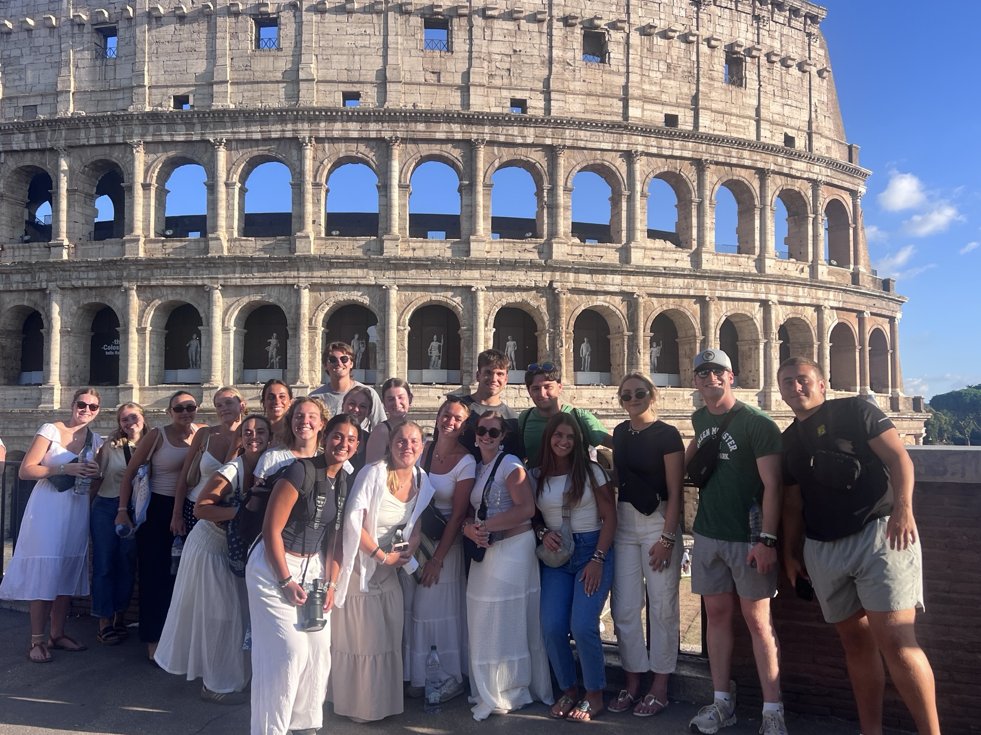 picture of my class in front of the Colosseum in Rome Italy