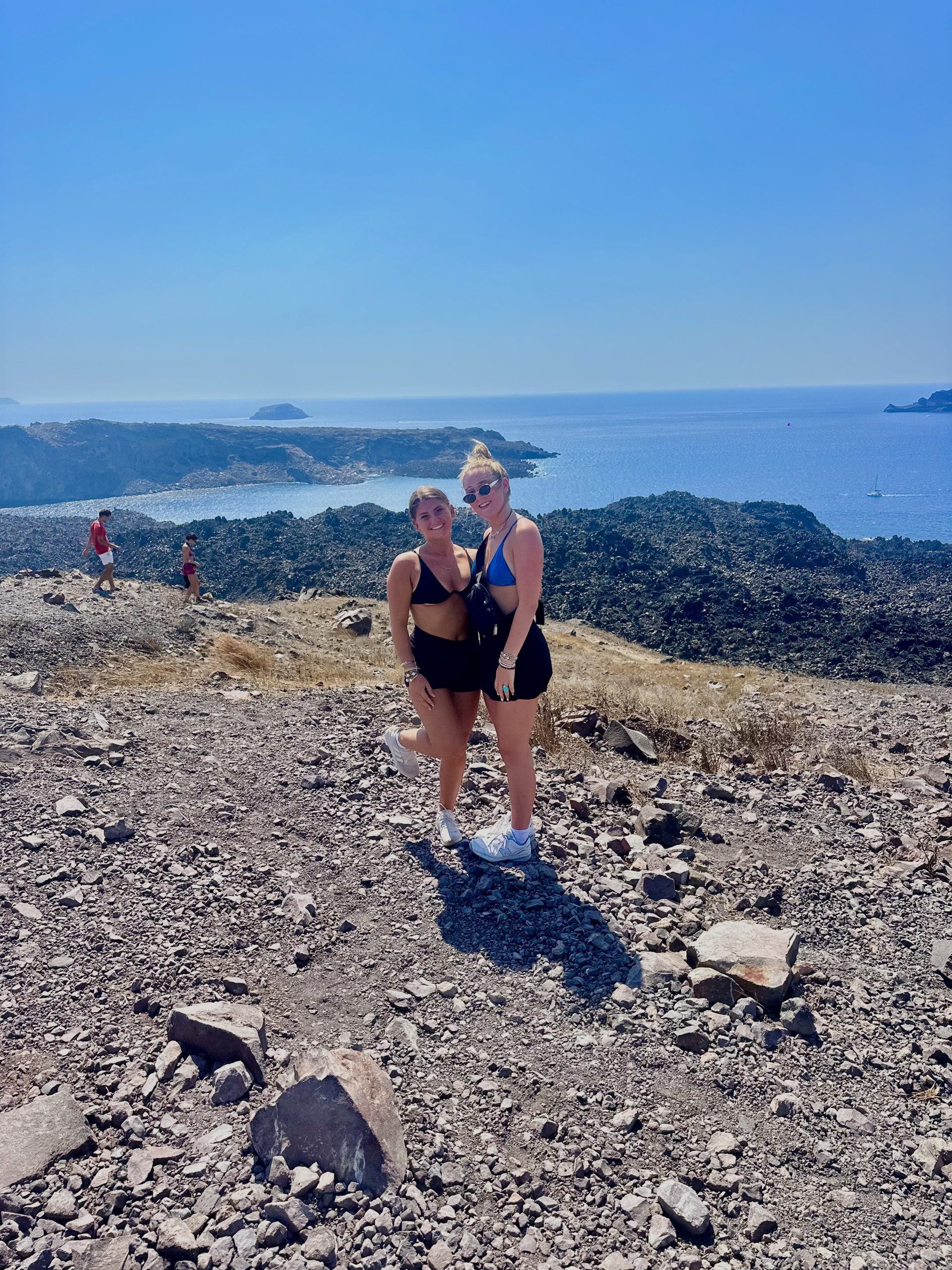 picture of me and my friend on the top of The Volcano of Santorini